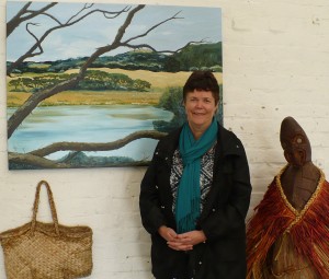 Bernie Malizia with one of her paintings of local Pa sites